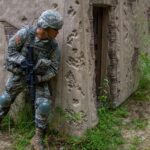 Spc. Kenny Ochoa watches for enemy combatants